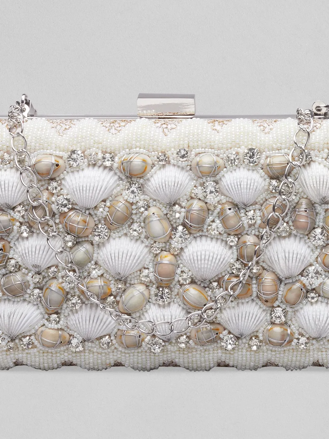 Rubans Off White Coloured Clutch Bag With Shells And Embroided White Design.